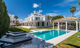 Unique luxury villa for sale in a modern, Andalusian architectural style, with sea views, within walking distance of Puerto Banus, Marbella 45909 