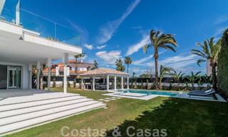 Unique luxury villa for sale in a modern, Andalusian architectural style, with sea views, within walking distance of Puerto Banus, Marbella 45919 