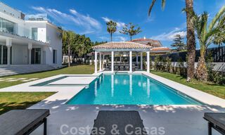 Unique luxury villa for sale in a modern, Andalusian architectural style, with sea views, within walking distance of Puerto Banus, Marbella 45920 