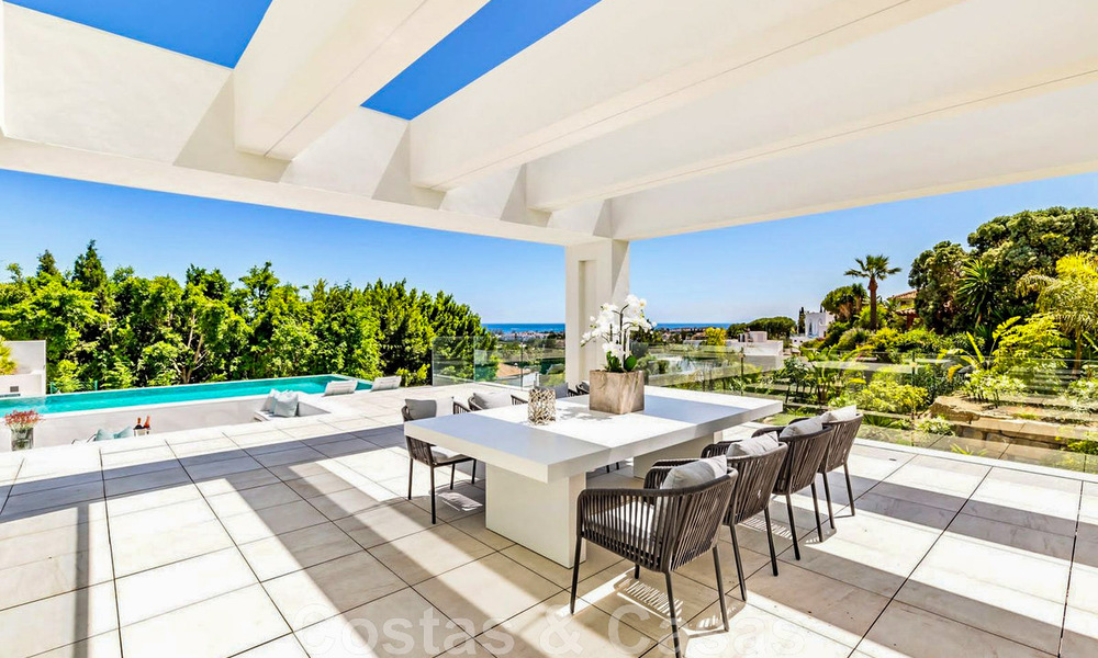 New, modernist designer villa for sale with panoramic views, located on the New Golden Mile in Marbella - Benahavis 45639
