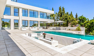 New, modernist designer villa for sale with panoramic views, located on the New Golden Mile in Marbella - Benahavis 45663 
