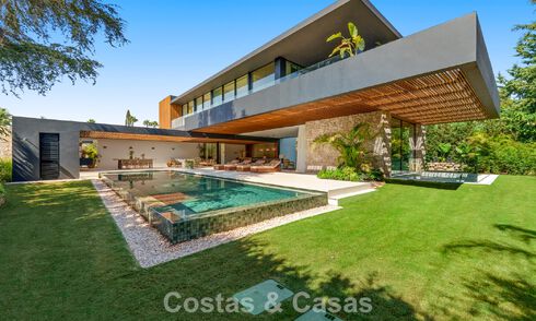 Avant-garde designer villa for sale with numerous luxury amenities, surrounded by golf courses in Nueva Andalucia, Marbella 786093