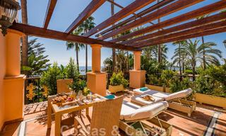 Spacious duplex, double, ground floor apartment in a frontline beach complex within walking distance to Puerto Banus, Marbella 46778 