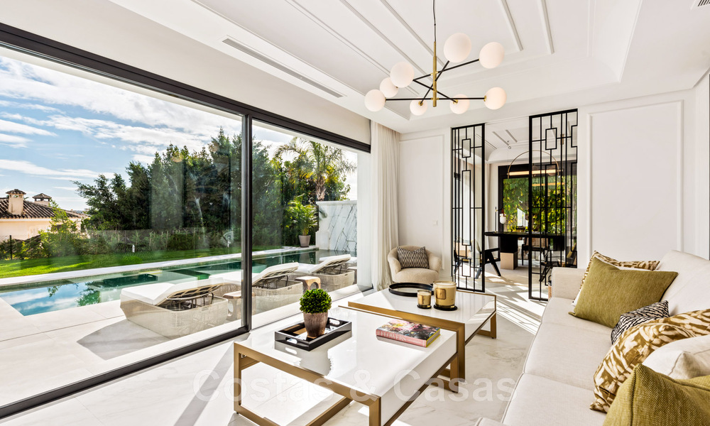 Designer villa for sale surrounded by golf courses in Nueva Andalucia's golf valley, Marbella 48758