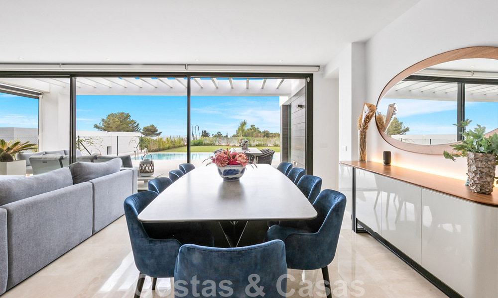 Move-in ready, contemporary villa for sale with sea views, in a gated villa development on the border of Mijas and Marbella 46095