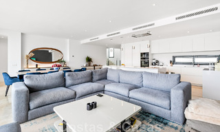 Move-in ready, contemporary villa for sale with sea views, in a gated villa development on the border of Mijas and Marbella 46097 