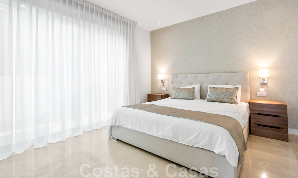 Move-in ready, contemporary villa for sale with sea views, in a gated villa development on the border of Mijas and Marbella 46102