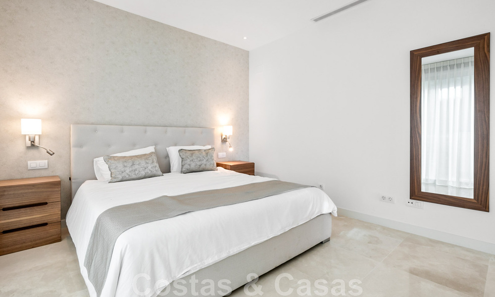 Move-in ready, contemporary villa for sale with sea views, in a gated villa development on the border of Mijas and Marbella 46103