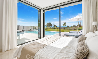 Move-in ready, contemporary villa for sale with sea views, in a gated villa development on the border of Mijas and Marbella 46105 