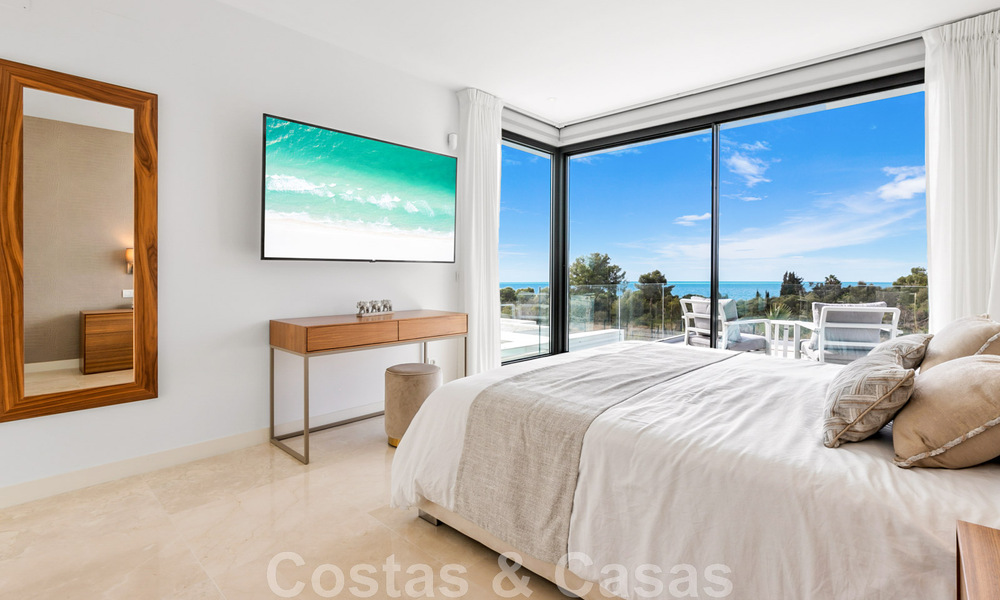 Move-in ready, contemporary villa for sale with sea views, in a gated villa development on the border of Mijas and Marbella 46107