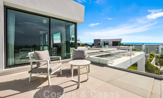 Move-in ready, contemporary villa for sale with sea views, in a gated villa development on the border of Mijas and Marbella 46108 