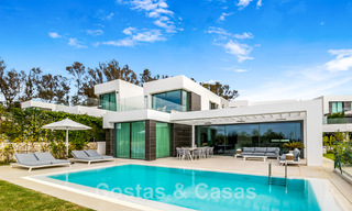Move-in ready, contemporary villa for sale with sea views, in a gated villa development on the border of Mijas and Marbella 46111 