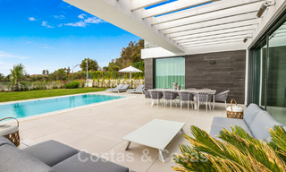 Move-in ready, contemporary villa for sale with sea views, in a gated villa development on the border of Mijas and Marbella 46114 