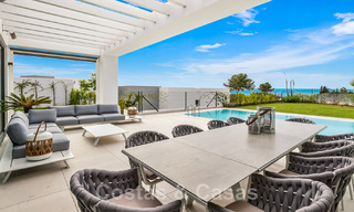 Move-in ready, contemporary villa for sale with sea views, in a gated villa development on the border of Mijas and Marbella 46115 