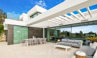 Move-in ready, contemporary villa for sale with sea views, in a gated villa development on the border of Mijas and Marbella 46117 