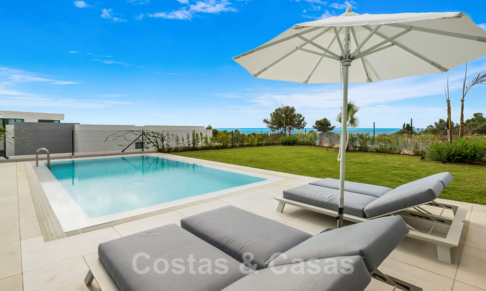 Move-in ready, contemporary villa for sale with sea views, in a gated villa development on the border of Mijas and Marbella 46119
