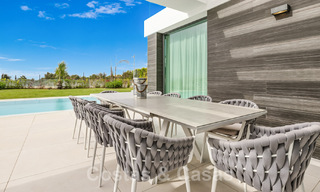 Move-in ready, contemporary villa for sale with sea views, in a gated villa development on the border of Mijas and Marbella 46120 