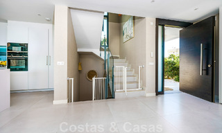 Move-in ready villa for sale with contemporary architecture in a gated villa community on the border of Mijas and Marbella 46367 