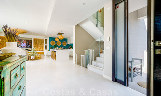 Move-in ready villa for sale with contemporary architecture in a gated villa community on the border of Mijas and Marbella 46368 