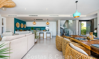 Move-in ready villa for sale with contemporary architecture in a gated villa community on the border of Mijas and Marbella 46372 