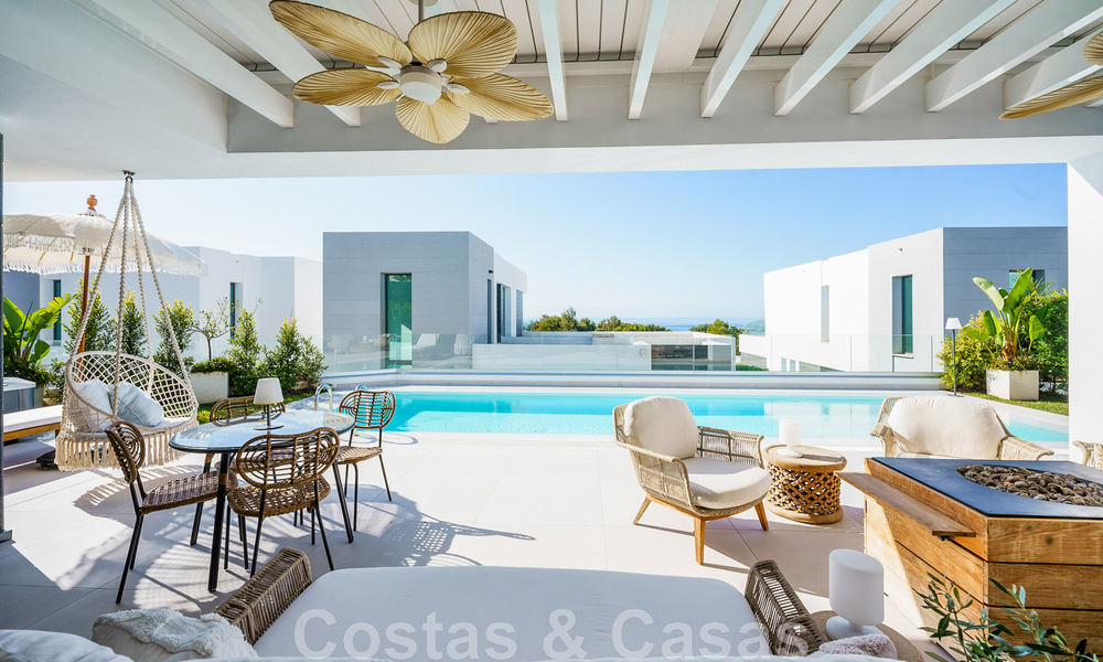 Move-in ready villa for sale with contemporary architecture in a gated villa community on the border of Mijas and Marbella 46400