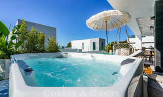 Move-in ready villa for sale with contemporary architecture in a gated villa community on the border of Mijas and Marbella 46406 