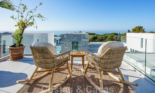 Move-in ready villa for sale with contemporary architecture in a gated villa community on the border of Mijas and Marbella 46409 