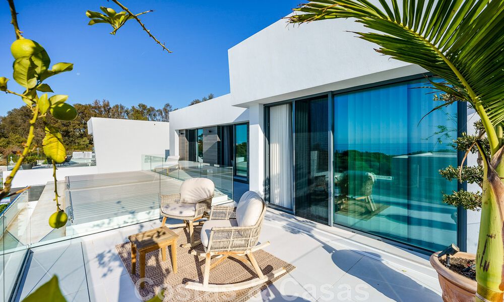 Move-in ready villa for sale with contemporary architecture in a gated villa community on the border of Mijas and Marbella 46410