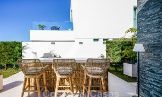 Move-in ready villa for sale with contemporary architecture in a gated villa community on the border of Mijas and Marbella 46416 