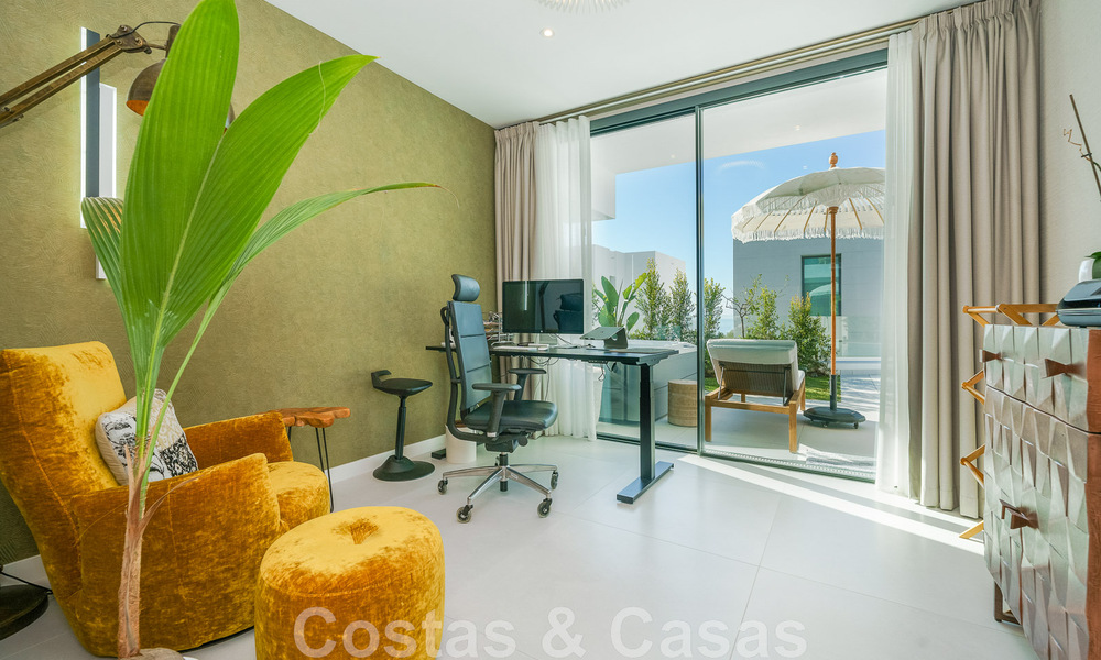 Move-in ready villa for sale with contemporary architecture in a gated villa community on the border of Mijas and Marbella 46417