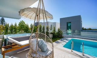 Move-in ready villa for sale with contemporary architecture in a gated villa community on the border of Mijas and Marbella 46419 