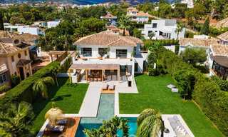 Move-in ready, luxury designer villa for sale within walking distance to amenities in the golf valley of Nueva Andalucia, Marbella 46697 