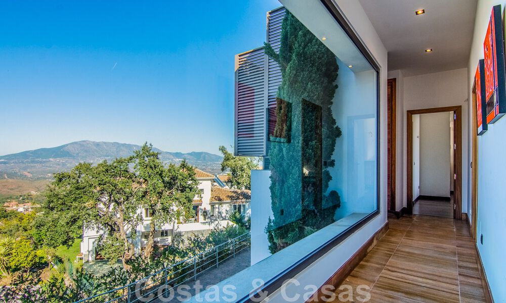 Detached villa for sale in a high position, with panoramic mountain and sea views in an exclusive urbanisation in East Marbella 46973