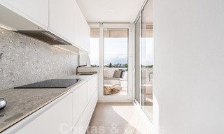 Contemporary renovated penthouse for sale with sea views within walking distance of all amenities, the beach and Puerto Banus in Nueva Andalucia, Marbella 47010 