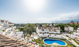 Contemporary renovated penthouse for sale with sea views within walking distance of all amenities, the beach and Puerto Banus in Nueva Andalucia, Marbella 47018 