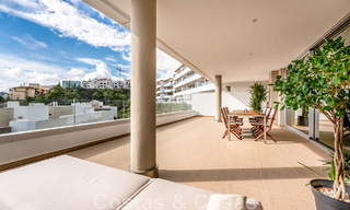 Move-in ready, elevated ground floor apartment for sale with panoramic valley and sea views in exclusive Benahavis - Marbella 47030 