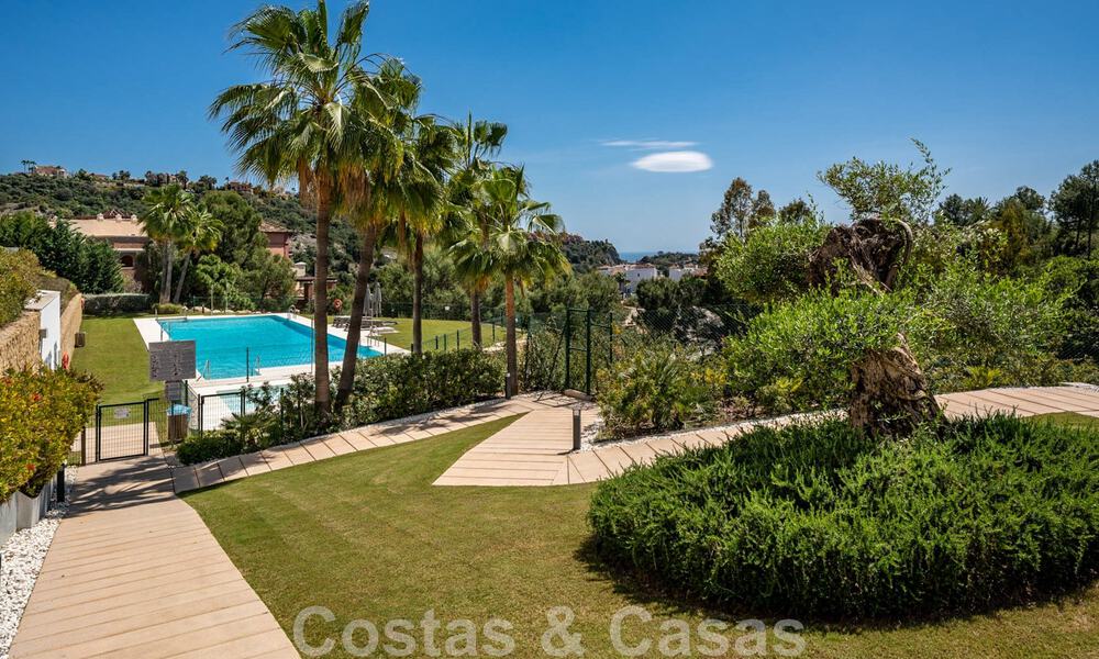 Move-in ready, elevated ground floor apartment for sale with panoramic valley and sea views in exclusive Benahavis - Marbella 47046