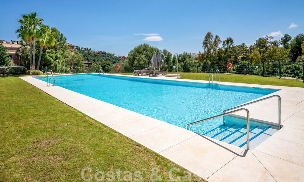 Move-in ready, elevated ground floor apartment for sale with panoramic valley and sea views in exclusive Benahavis - Marbella 47047