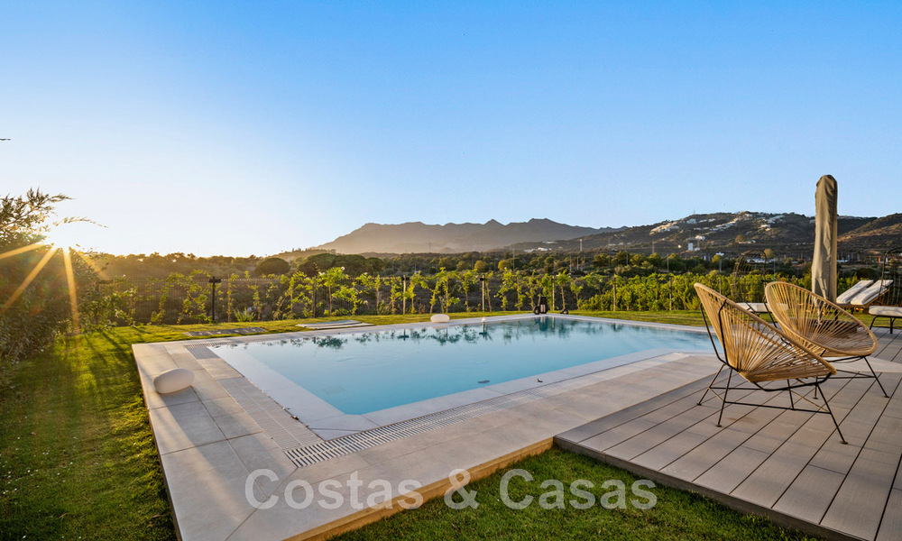 Spacious luxury villa for sale, designed in modern architectural style, with golf and sea views in a gated golf resort just east of Marbella centre 47326