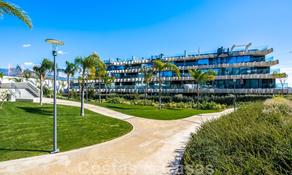 Contemporary corner apartment for sale with a large private garden on the coveted New Golden Mile between Marbella and Estepona 47154