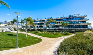 Contemporary corner apartment for sale with a large private garden on the coveted New Golden Mile between Marbella and Estepona 47154 