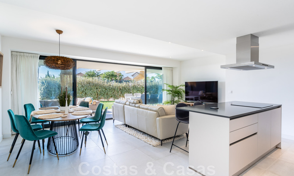 Contemporary corner apartment for sale with a large private garden on the coveted New Golden Mile between Marbella and Estepona 47161