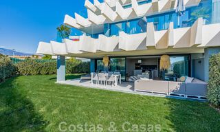 Contemporary corner apartment for sale with a large private garden on the coveted New Golden Mile between Marbella and Estepona 47166 