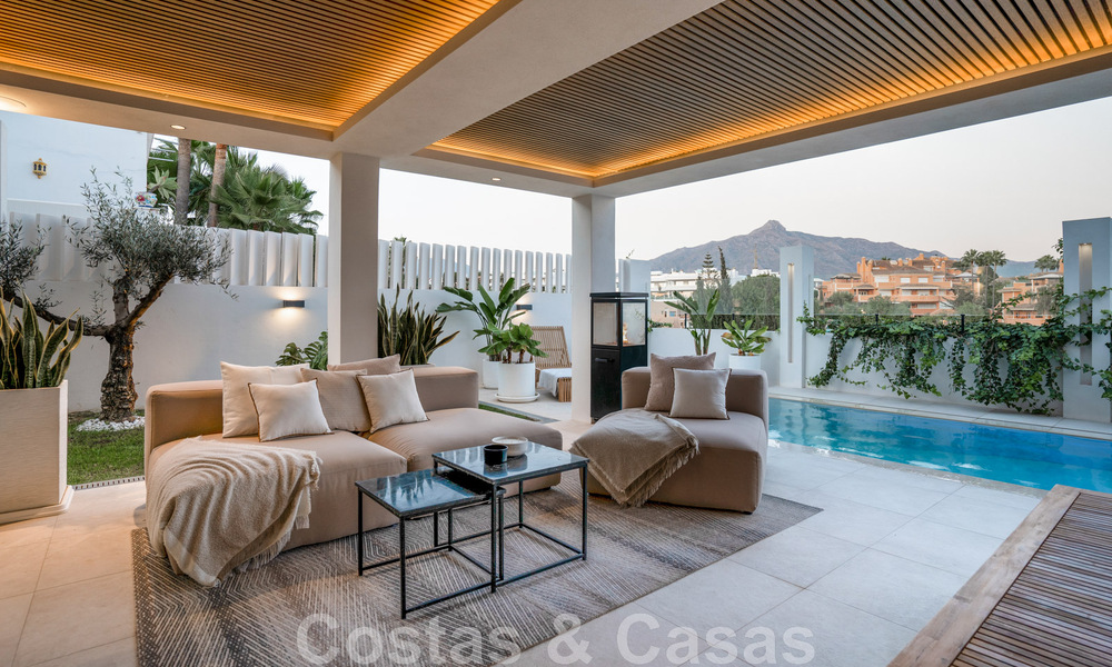 New on the market! Unique villa for sale, with cosy outdoor spaces and panoramic views in Nueva Andalucia, Marbella. Walking distance to Puerto Banus. 47580