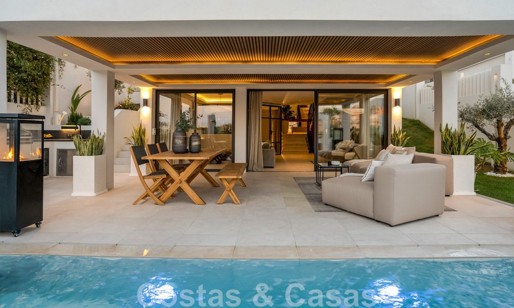 New on the market! Unique villa for sale, with cosy outdoor spaces and panoramic views in Nueva Andalucia, Marbella. Walking distance to Puerto Banus. 47583