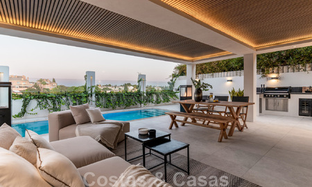 New on the market! Unique villa for sale, with cosy outdoor spaces and panoramic views in Nueva Andalucia, Marbella. Walking distance to Puerto Banus. 47584
