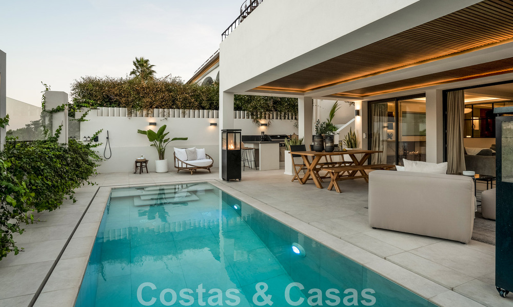 New on the market! Unique villa for sale, with cosy outdoor spaces and panoramic views in Nueva Andalucia, Marbella. Walking distance to Puerto Banus. 47585