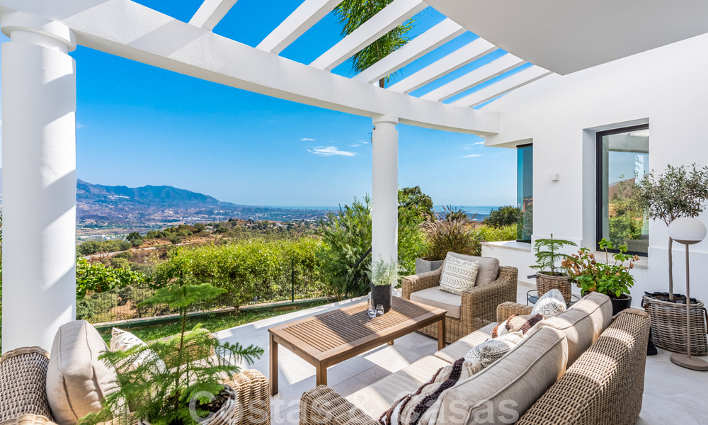 Detached, Andalusian villa for sale with panoramic mountain and sea views in an exclusive urbanisation in East Marbella 47360