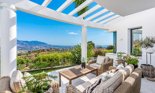 Detached, Andalusian villa for sale with panoramic mountain and sea views in an exclusive urbanisation in East Marbella 47360 