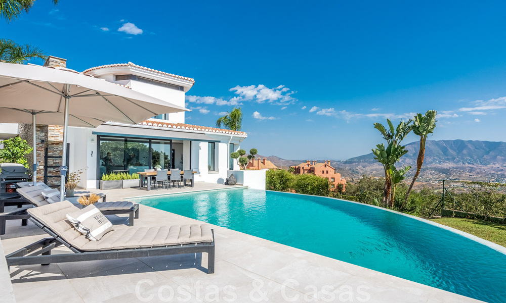 Detached, Andalusian villa for sale with panoramic mountain and sea views in an exclusive urbanisation in East Marbella 47373